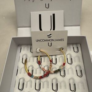 Uncommon James gold with fabric wrap hoop earrings.